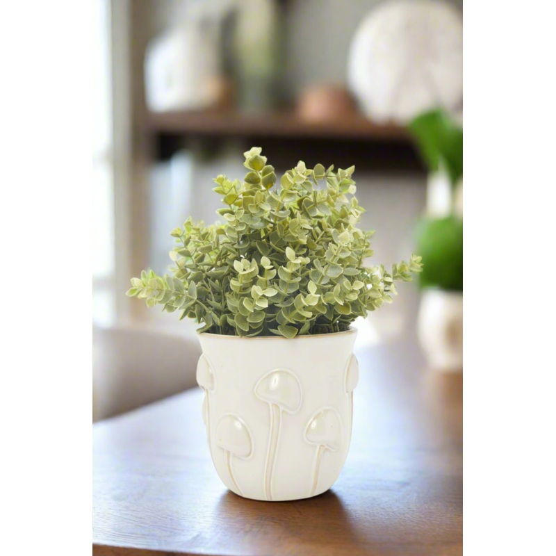 Green Artificial Plant In Ceramic Pot