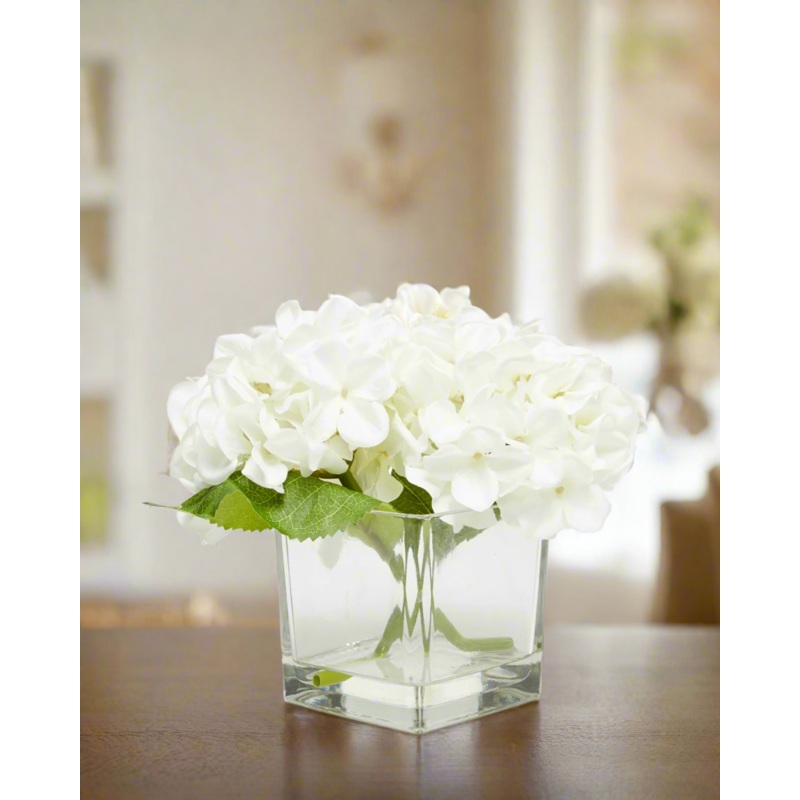 White Hydrangea In Glass Vase