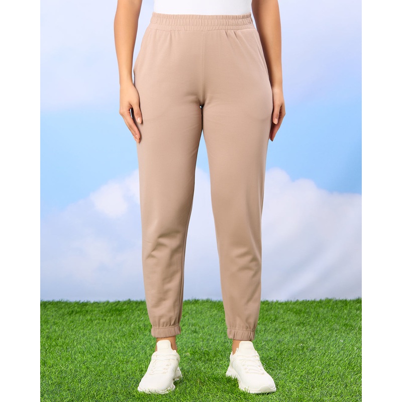 Woman Beige Solid Active Pants