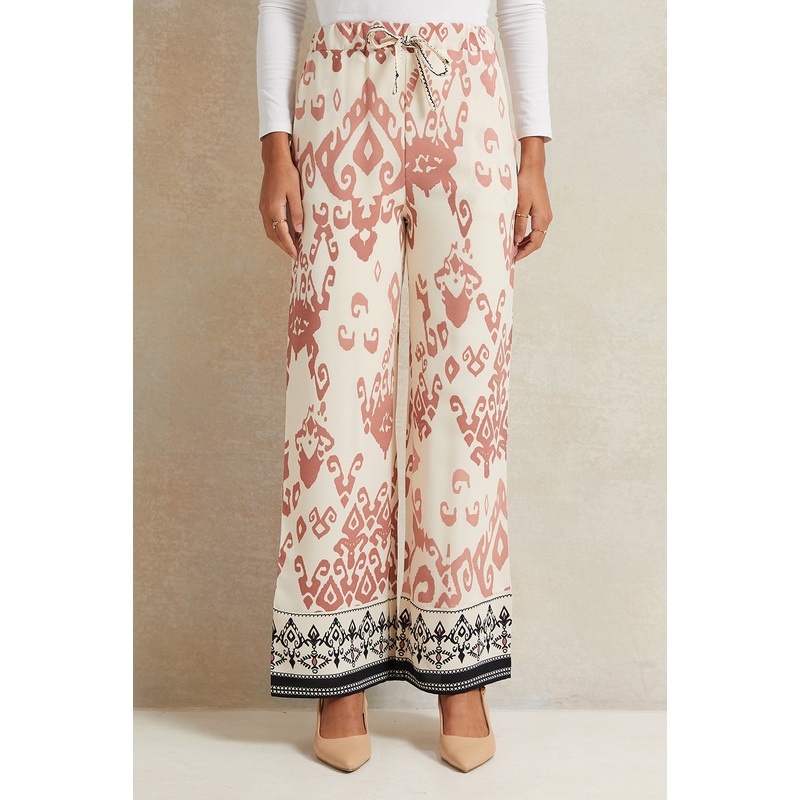 Women Cream Printed Wide Leg Trousers