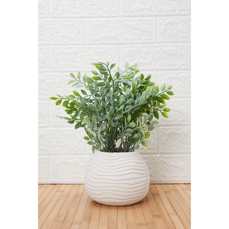 Green Artificial Plant In Cement Pot