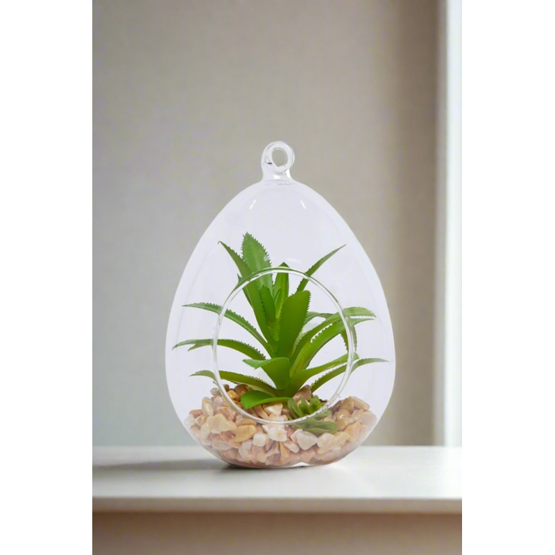 Green Artificial Plant In Glass Pot